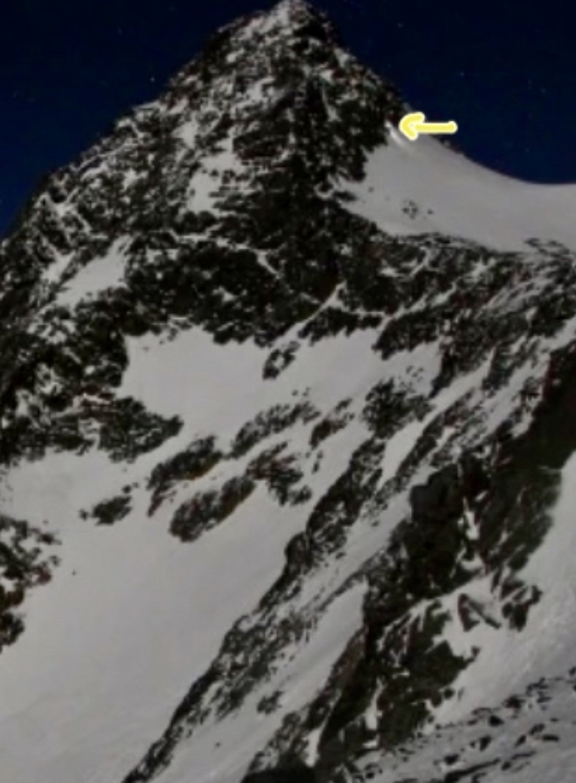 The webcam recorded the descent too. Marked the man's headlamp.