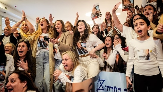 Family members and supporters of the hostage Agam Berger celebrated her release.(REUTERS)