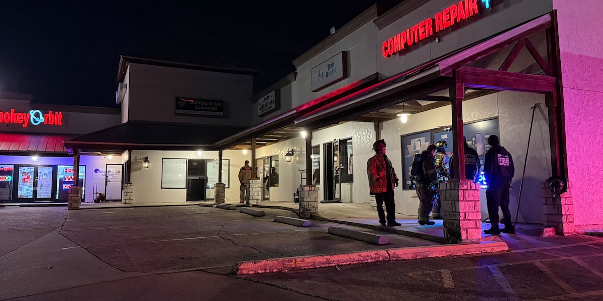 Firefighters respond to fire inside business on E 29th St in Bryan