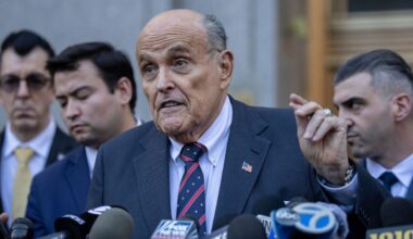Former New York City Mayor Rudy Giuliani speaks to the members of the media as he leaves court in New York, Thursday, Nov. 7, 2024. (AP Photo/Yuki Iwamura)