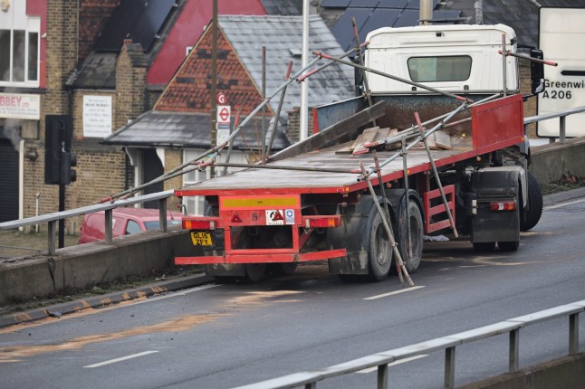 ??George Cracknell Wright 10/01/2025 London, United Kingdom Blackwall Tunnel Crash Two lanes have been closed following a crash involving a flat-bed lorry on A102 Blackwall Tunnel Approach Northbound in Greenwich, South East London. It is not known what caused the incident however drivers have been advised to take extra care when travelling in icy conditions after freezing weather arrived in the UK. Temperatures in London dropped to minus two degrees last night with yellow weather warnings for ice in place across the United Kingdom. Photo Credit: George Cracknell Wright