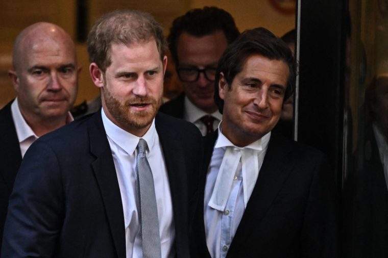(FILES) Britain's Prince Harry, Duke of Sussex (2L) and his Barrister David Sherborne (R) leave the Royal Courts of Justice, Britain's High Court, in central London on June 7, 2023. Prince Harry dramatically settled on January 22, 2025, a hotly disputed lawsuit against Rupert Murdoch's UK tabloid publisher, which apologised for hacking the British royal's phone and agreed to pay him "substantial damages". Murdoch's News Group Newspapers offers "a full and unequivocal apology" to the prince "for the phone hacking, surveillance and misuse of private information by journalists and private investigators instructed by them", NGN's lawyer Anthony Hudson told the High Court in London. (Photo by Ben Stansall / AFP) (Photo by BEN STANSALL/AFP via Getty Images)