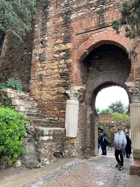 A keyhole shaped door that is at least 25 feet high