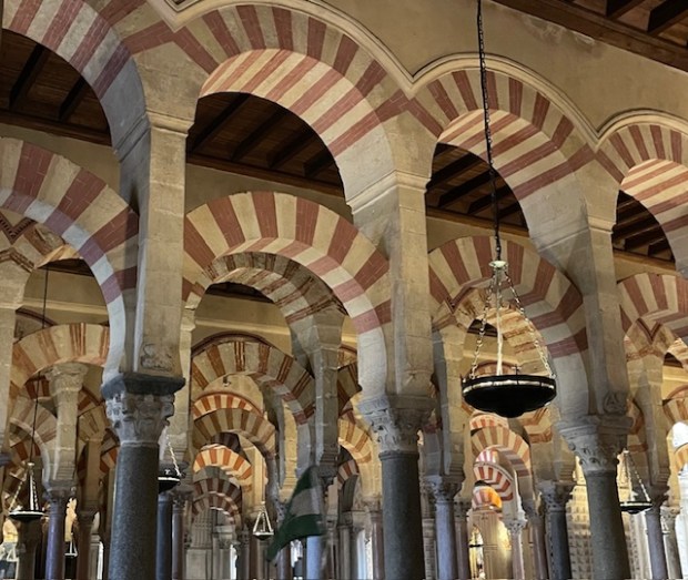 Red and white striped arches