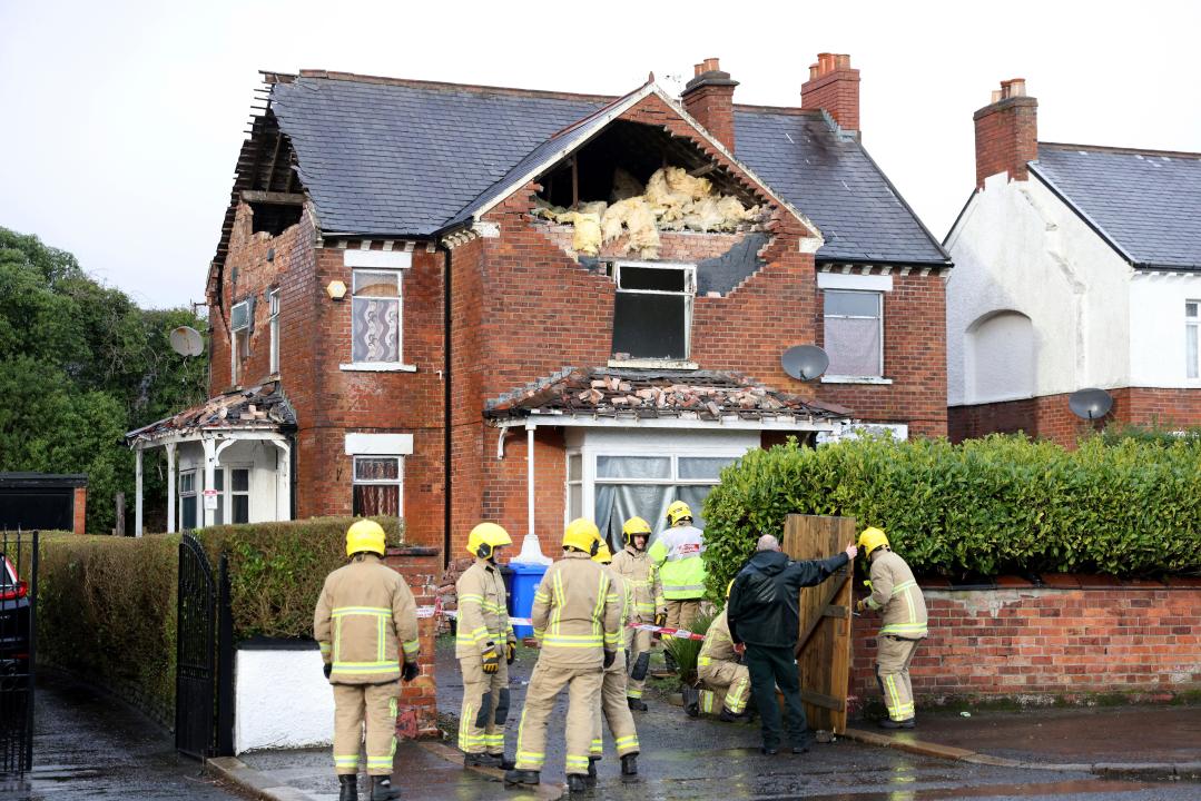Firemen secure a house that was damaged by the winds of storm Eowyn that hit the country in Belfast, Northern Ireland, Friday, Jan. 24, 2025.(AP Photo)