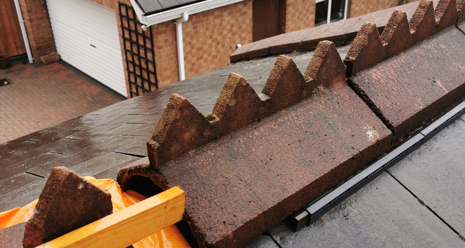 Storm damage. Roof tiles.
