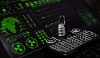 Cyber Security concept, padlock, small keyboard, and hacker screen