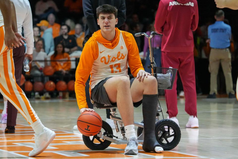 Tennessee forward J.P. Estrella (13) dribbles a ball during warm-ups a college basketball game between Tennessee and Arkansas held at Thompson-Boling Arena at Food City Center in Knoxville, Tenn., on Saturday, January 4, 2025. Angelina Alcantar/News Sentinel / USA TODAY NETWORK via Imagn Images