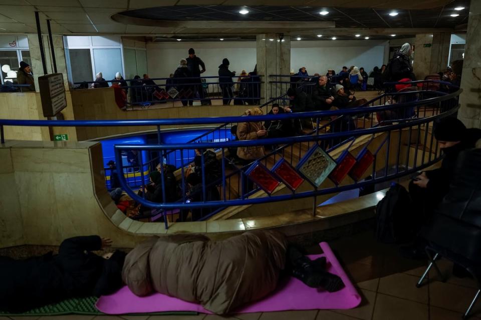 People take shelter inside a Kyiv metro station during a Russian military strike (REUTERS)