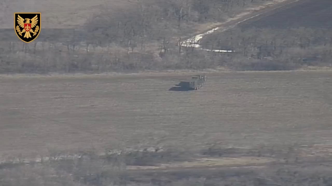 A Ukrainian drone operator spots a Russian 96L6E "Cheese Board" radar system on the way to its area of operation. The vehicle gets hit by a very accurate HIMARS strike as soon as it started operating.