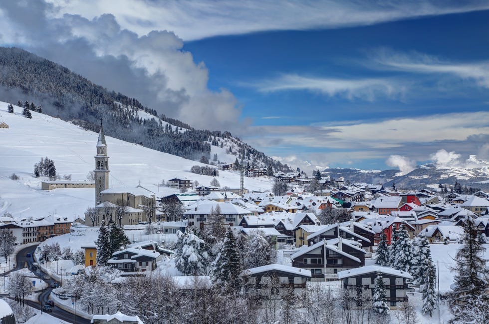 italy, gallio december, 2020 winter panorama of the village of gallio on the asiago plateau