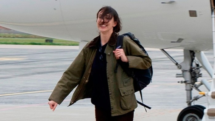 Cecilia Sala, an Italian journalist who was detained as she was reporting in Iran walks on the tarmac as she landed at Rome’ Ciampino airport after being released