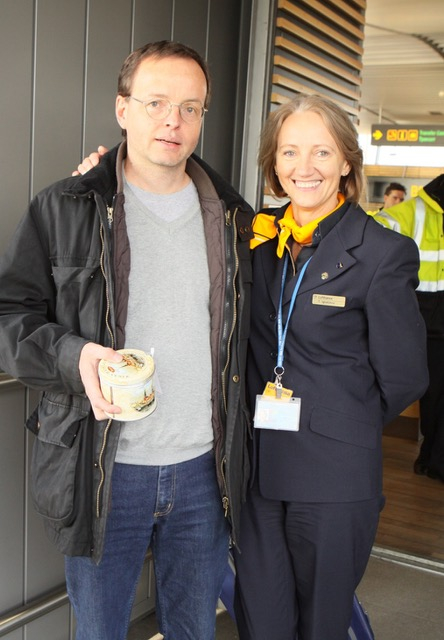 Neil Ebden and Lufthansa representative Tatjana Ignatjeva after the arrival of the 20 years annivers...