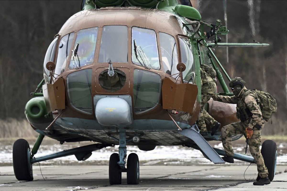 Russian Soldiers Boarding a Mi-8 Helicopter