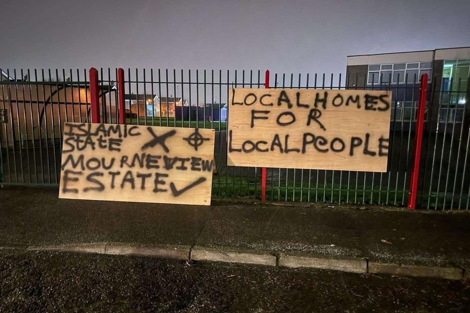 Police investigate racist signs placed outside NI primary school
