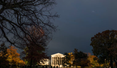 A beam of sunlight breaks through the cloudy skies to illuminate the Supreme Court in Washington.