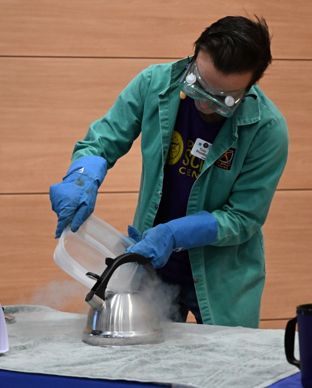 Da Vinci Science Center employee Tom Prostko performs a demonstration featuring liquid nitrogen Saturday, Jan. 4, 2025, during Ice Cream Wars at Da Vinci Science Center in Allentown. The annual event features Lehigh Valley businesses creating unique flavors of ice cream, with attendees casting votes to determine the champion. (Amy Shortell/The Morning Call)