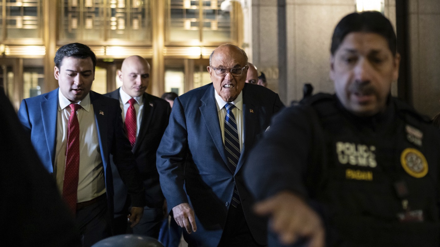 Rudy Giuliani is held in contempt of court in $148 million defamation case : NPR