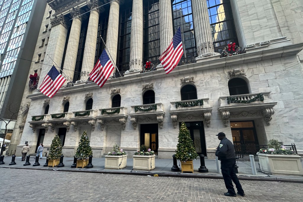 Wall Street recoils after good news on the economy raises inflation worries
