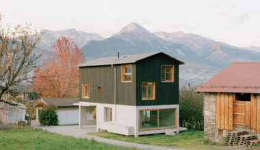 lionel ballmer architectes' wood house echoes barns of switzerland