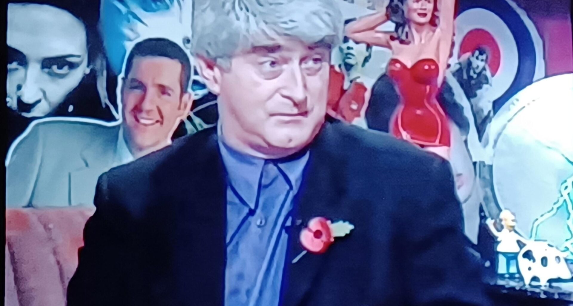 Ach sure, it's himself wearing a poppy.