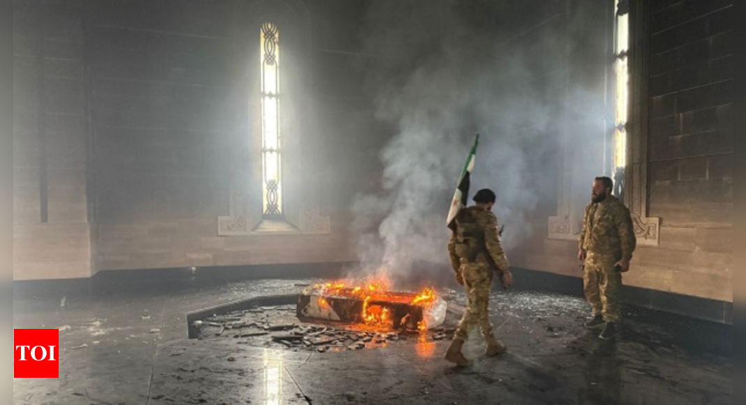 Syria Civil War: Tomb of ousted president Bashar al-Assad's father torched in Qardaha