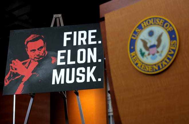 A sign is seen at a press conference held by the Congressional Progressive Caucus on the activities of Elon Musk's Department of Government Efficiency at the U.S. Capitol on February 06, 2025 in Washington, DC.