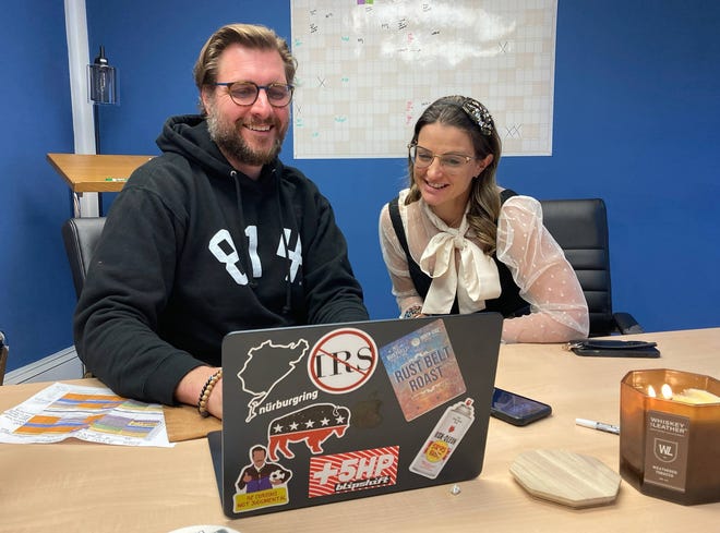 From left, Adam Williams, the founder of Rust Belt Business Law, and his wife, Jackie.