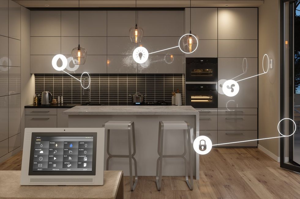 Smart Home Control System With App Icons In Kitchen. Close-up View Of Digital Tablet With Home Automation System On Screen stock photo
