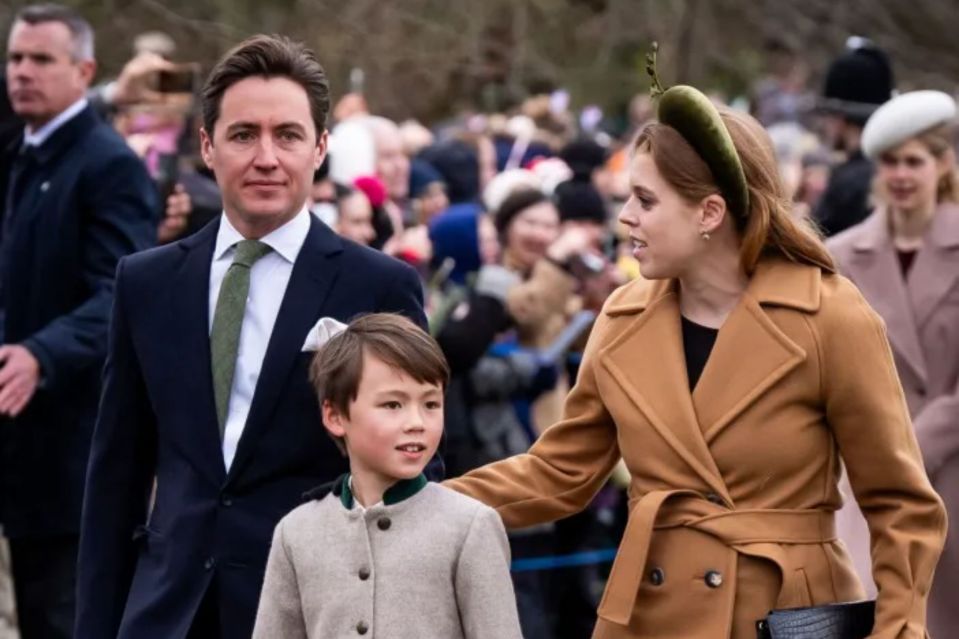 Princess Beatrice, Edoardo Mapelli Mozzi, and their son at an outdoor event.