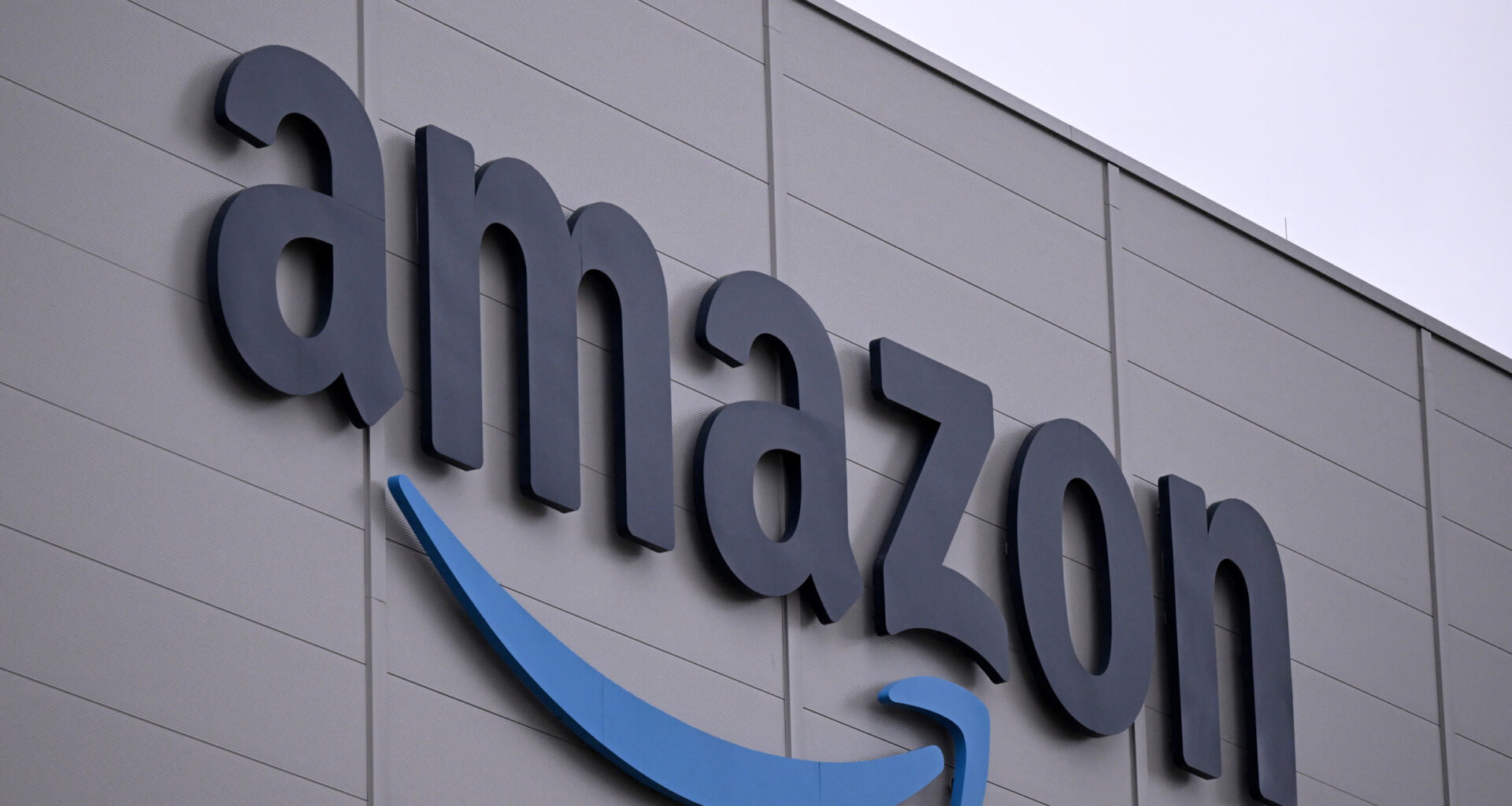 The logo of Amazon on building