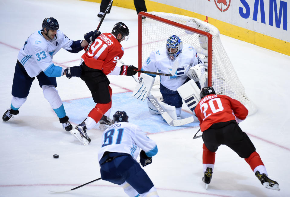 Team Canada players John Tavares (20) and Steven Stamkos (91) look for the puck between Team Europe players Marian Hossa (81) , Zdeno Chara (33) and Jaroslav Halak (41) during the game one of the 2016 World Cup of Hockey final. Credit: Dan Hamilton-Imagn Images