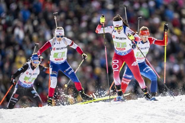 Slovak biathlete Anastasia Kuzmina (right, in the back) during the mixed relay race at the IBU Biathlon World Championships, in Lenzerheide, Switzerland.
