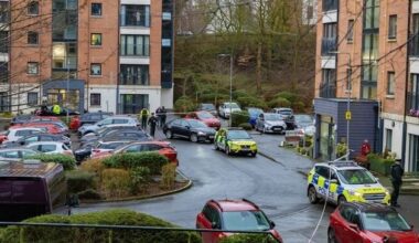Police issue warning over social media speculation as officers remain at scene of Dunmurry sudden death