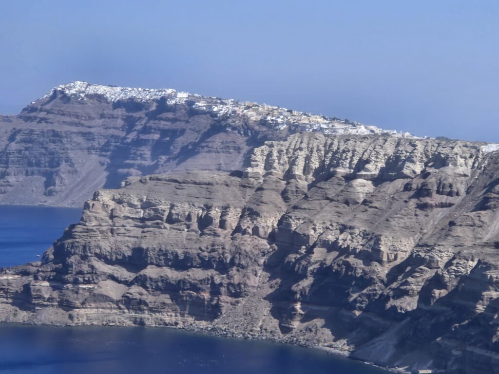 Santorini sits on the edge of the caldera of an ancient volcano. Scientists aren't sure if a new eruption will occur here soon.  Image: Weatherboy