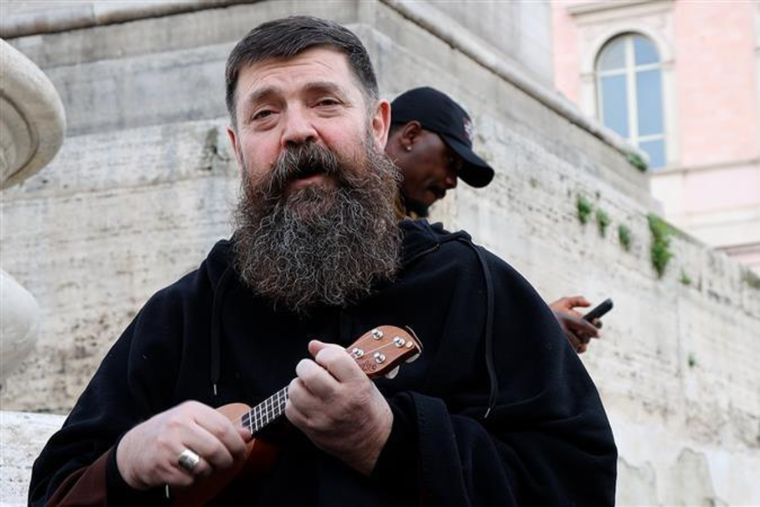 Bishop David Tencer of Reykjavik, Iceland, plays the ukulele during a pilgrimage to Rome in early February 2025.
