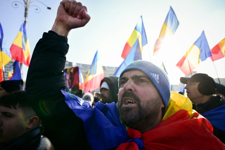 In January, tens of thousands of Romanians protested the cancellation of the vote (Daniel MIHAILESCU)