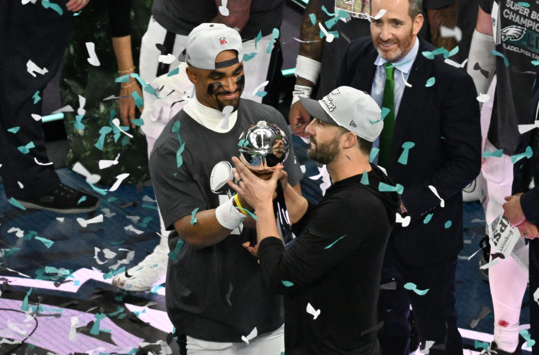 Philadelphia Eagles' quarterback #01 Jalen Hurts and head coach Nick Sirianni hold the Lombardi trophy at the end of Super Bowl LIX, after the Philadelphia Eagles defeated the Kansas City Chiefs 40-22 at Caesars Superdome in New Orleans, Louisiana, February 9, 2025. (Photo by Chandan Khanna / AFP) (Photo by CHANDAN KHANNA/AFP via Getty Images)          