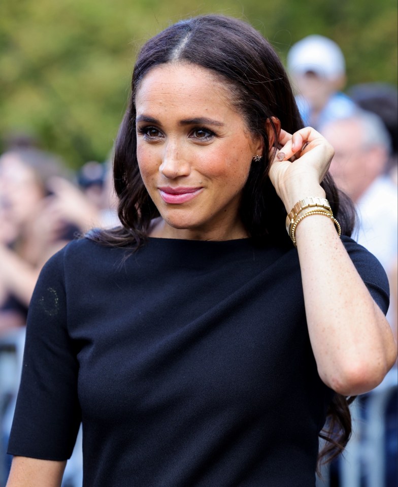 The Duchess of Sussex greeting members of the public at Windsor Castle.