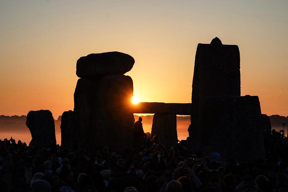 Sun rises at Stonehenge near Amesbury in Wiltshire (AFP via Getty)