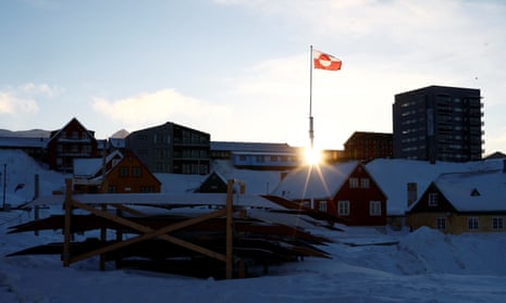 Greenland’s flag flies over Nuuk in Greenland.