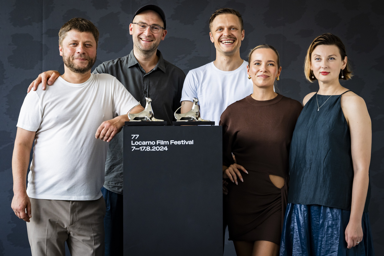 A happy crew: from left, actor Giedrius Kiela, director Laurynas Bareisa, and actors Paulius Markevicius, Gelmine Glemzaite, and Agne Kaktaite pose with their awards for "Best Performance" and "Best Director" in Locarno.