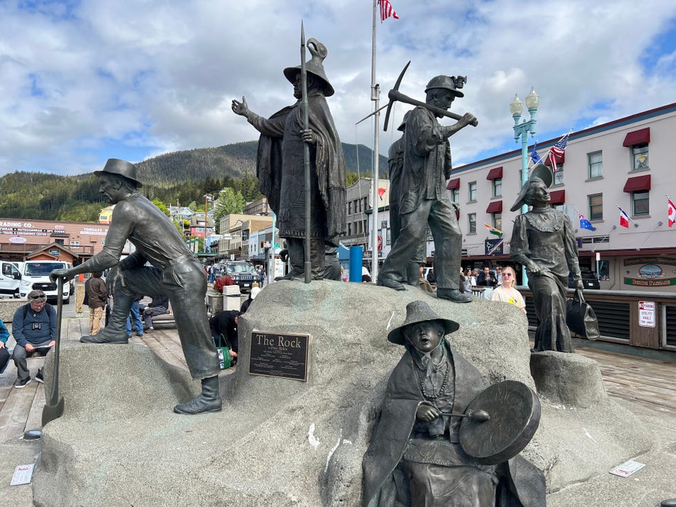 "The Rock" statue in Ketchikan, Alaska honors the city's heritage.
