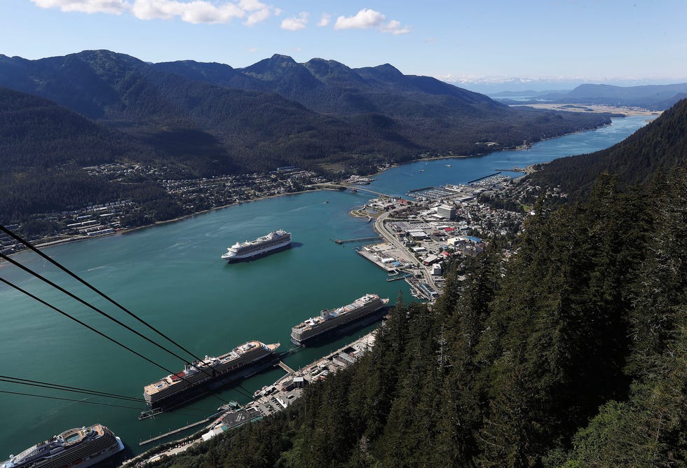 Cruise ships are docked in this mountain view of downtown Juneau and the Gastineau Channel in Juneau, Alaska, on Aug. 27, 2023.