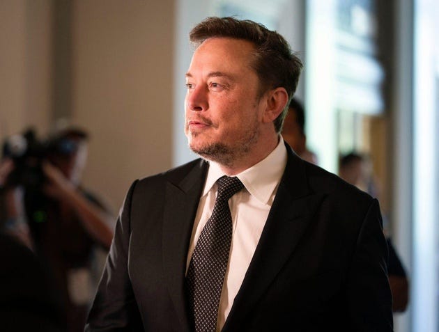 Elon Musk, CEO of X and Tesla, arrives before the Inaugural Artificial Intelligence Insight Forum on Dec. 5, 2024.