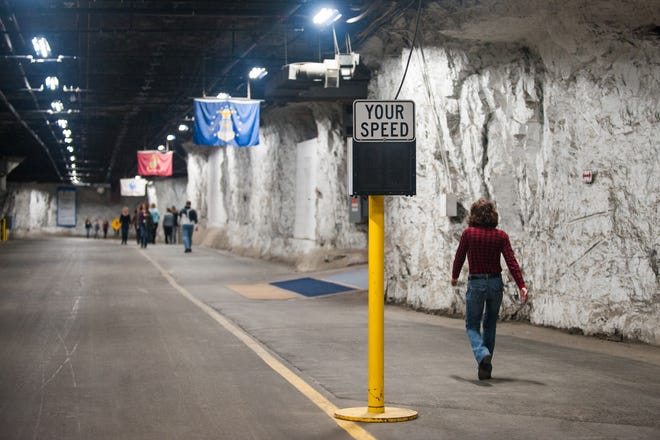 Employees walk along a roadway inside the Iron Mountain Inc. data storage facility in Boyers, Pennsylvania, on Tuesday, Feb. 13, 2018.
