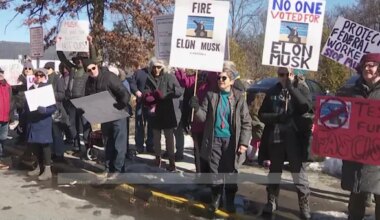 Nearly 300 demonstrators gather at Mount Kisco Tesla showroom to protest DOGE job and program cuts