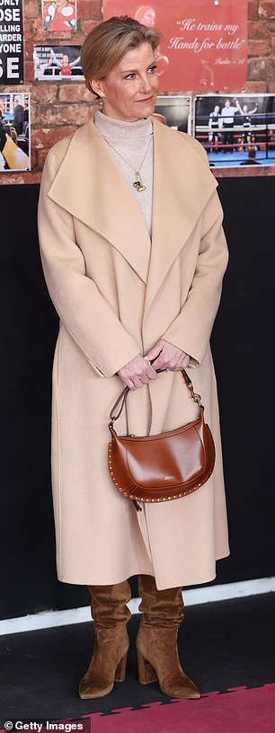Visiting the Right Stuff Amateur Boxing Club in Staffordshire last year, Sophie teamed a camel Reiss knitted dress with Gianvito Rossi suede boots and an Isabel Marant studded bag