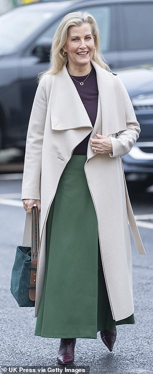 Sophie's colour-block look, featuring wearing a Whistles jumper, Alberta Ferretti skirt and Jimmy Choo boots, resembled Kate's