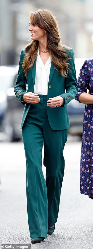 In September 2023, Kate revisited her Burberry forest green trouser suit while touring Yorkshire's AW Hainsworth textile mill